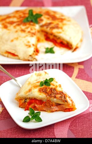 Le pizze torta. Ricetta disponibile. Foto Stock