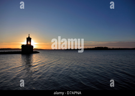 Sunset over Normanton chiesa, Rutland Serbatoio acqua; Rutland County; Inghilterra; Regno Unito Foto Stock