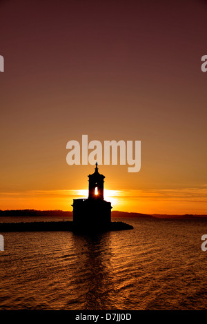 Sunset over Normanton chiesa, Rutland Serbatoio acqua; Rutland County; Inghilterra; Regno Unito Foto Stock