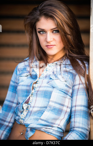 Stati Uniti d'America, Texas, Ritratto di cowgirl, sorridente Foto Stock