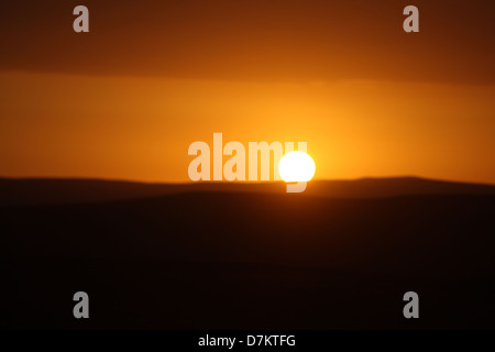 Tramonto nel deserto Foto Stock