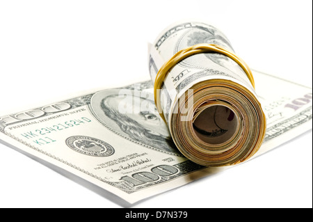 Rotolo di fatture del dollaro sul centinaio di dollari Foto Stock