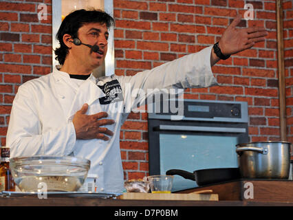 Il francese chef celebrità Jean-Christophe Novelli dimostra cookery Foto Stock