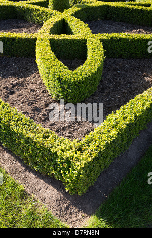 Casella di formale nella copertura ornamentale in Stratford Warwickshire Inghilterra Foto Stock