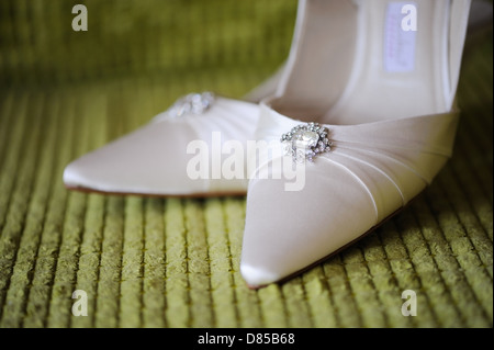 Brides scarpe closeup sul giorno di nozze Foto Stock