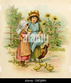 Due ragazze con i loro polli Foto Stock