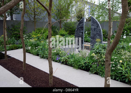 Il Fera Giardino: fermare la diffusione, espositore: il cibo e l'ambiente Agenzia di ricerca, Designer: Jo Thompson. Chelsea Flower Show 2013 Foto Stock