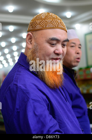 Hui uomo musulmano nella bazzar in Xian, Cina. Foto Stock