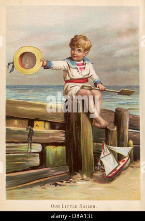 Sailor Boy a Seaside Foto Stock