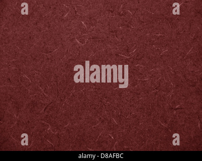 Vista ravvicinata di un piano di lavoro in laminato con motivo astratto color marrone, che presenta una superficie liscia e un design colorato unico. La texture aggiunge un tocco sofisticato a qualsiasi cucina o spazio di lavoro. Foto Stock