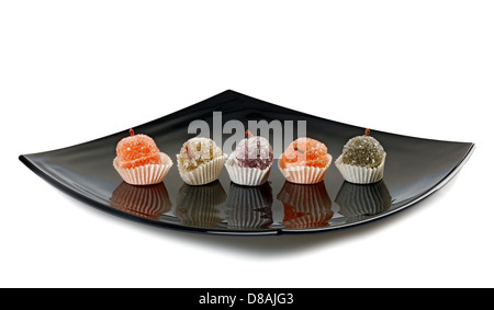 Colore gelatine di frutta caramelle in Nero piatto Foto Stock