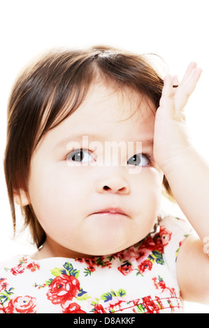 Bambina cercando confuso o distressed closeup ritratto Foto Stock