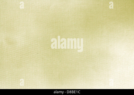 Questa foto stock mostra una vista ravvicinata della trama della carta in lino dorato, caratterizzata da un sottile motivo intrecciato con ricche tonalità dorate, ideale per applicazioni artistiche e di design. Foto Stock