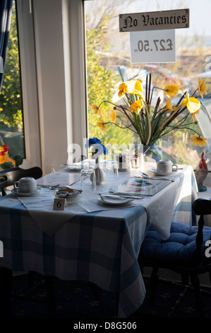 Sala da pranzo di tipico British bed and breakfast Foto Stock