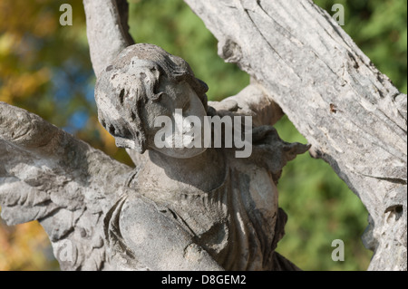 Oggetto contrassegnato per la rimozione definitiva di un Angelo con una croce Foto Stock