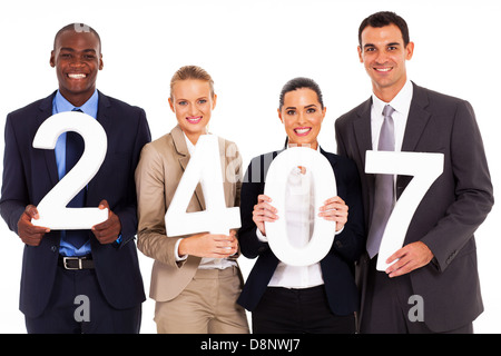 Un gruppo di persone di affari che contengono numeri Foto Stock