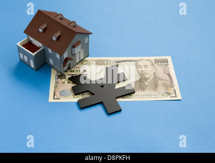 Yen segno, 10.000 yen fattura e un modello architettonico Foto Stock