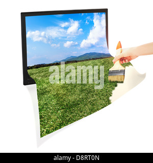 Idea concettuale: monitor, la mano e il pennello isolati su sfondo bianco. Foto Stock