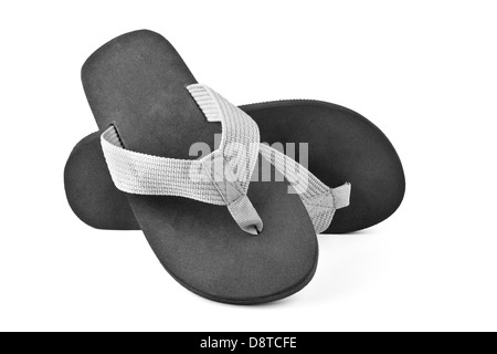 Coppia di nero flip flop isolato su bianco Foto Stock
