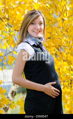 Incinta giovane donna Foto Stock