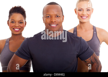 Ritratto sportivo da uomo africano e due donne su sfondo bianco Foto Stock