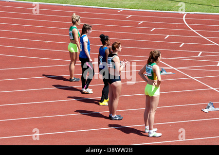 Atletica, ragazze adolescenti 100m gara. Foto Stock