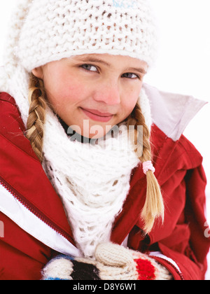 Una ragazza vestita in abbigliamento invernale, ritratto. Foto Stock
