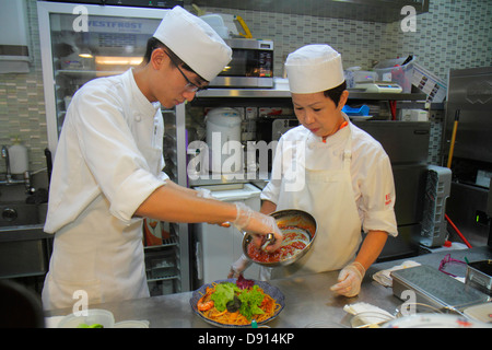 Singapore,Raffles City,shopping shopper shoppers negozio negozi mercati di mercato acquisti di mercato vendita, negozi al dettaglio negozi business business business, Centre,c Foto Stock