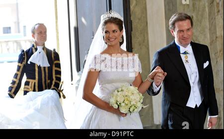 Stoccolma, Svezia. 8 Giugno, 2013. Swedish Princess Madeleine e suo marito Chris O'Neill a Stoccolma, Svezia, dopo il loro matrimonio 08 Giugno 2013. Foto: Frank può picture alliance ACE Foto Stock