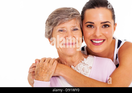 Felice senior madre e figlia adulta closeup ritratto su bianco Foto Stock