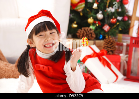 Ragazza con lecca-lecca Foto Stock