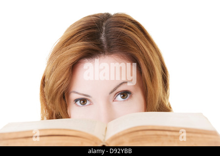 Attraente donna adulta con libri, isolato su bianco Foto Stock