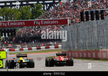 Montreal, Canada. Il 9 giugno 2013. Motorsports: FIA Formula One World Championship 2013, il Gran Premio del Canada, #20 Charles Pic (FRA, Caterham Team di F1), #23 Max Chilton (GBR, Marussia F1 Team), Credit: dpa picture alliance/Alamy Live News Foto Stock