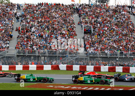 Montreal, Canada. Il 9 giugno 2013. Motorsports: FIA Formula One World Championship 2013, il Gran Premio del Canada, #21 Giedo Van der Garde (NLD, Caterham Team di F1), #20 Charles Pic (FRA, Caterham Team di F1), #22 Jules Bianchi (FRA, Marussia F1 Team), start, massa, Masse, Menge, viele, molti crediti: dpa picture alliance/Alamy Live News Foto Stock