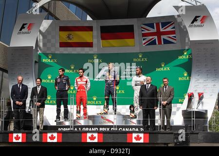 Montreal, Canada. Il 9 giugno 2013. top tre sul podio (L-R) Fernando Alonso (ESP), la Scuderia Ferrari (2nd), Sebastian Vettel (GER), Infiniti Red Bull Racing (vincitore di gara) e Lewis Hamilton (GBR), Mercedes AMG Petronas Team di F1 (3a) - Formula1 nel Campionato del Mondo 2013 - Round 07 sul Circuito Gilles Villeneuve di Montreal, Canada - Domenica 9 giugno 2013 Credit: dpa picture alliance/Alamy Live News Foto Stock