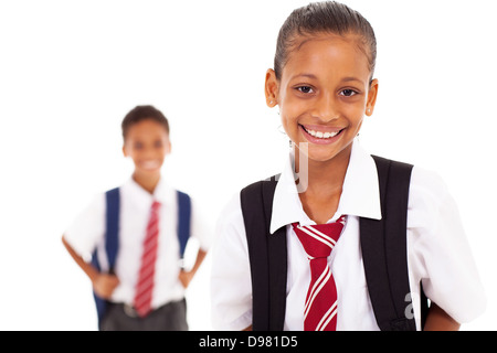 Carino schoolgirl elementare nella parte anteriore del compagno di classe Foto Stock