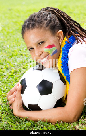 Femmina South African tifoso di calcio Foto Stock