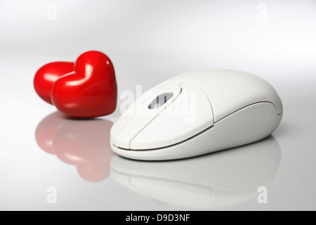 Cuori con mouse - on-line la mediazione dei partner Foto Stock