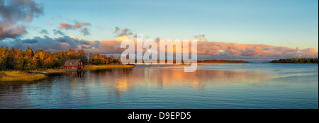 Autunno tramonto al litorale Balticsea Foto Stock