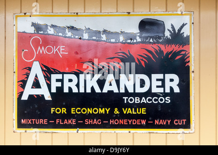 Rosso e nero smalto vintage segno pubblicità Afrikander Tabacchi Foto Stock