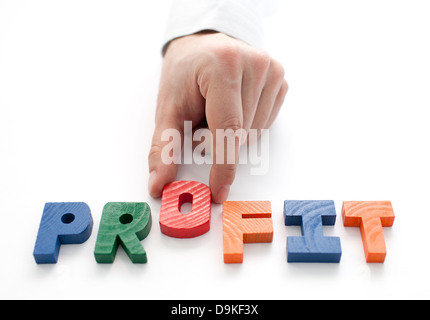 Mano e parola profitto su sfondo bianco Foto Stock