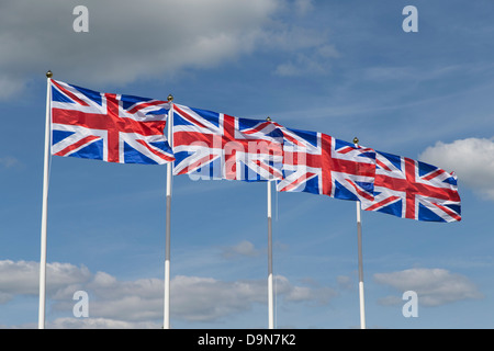 Quattro Union Jack Flag su pennoni Foto Stock