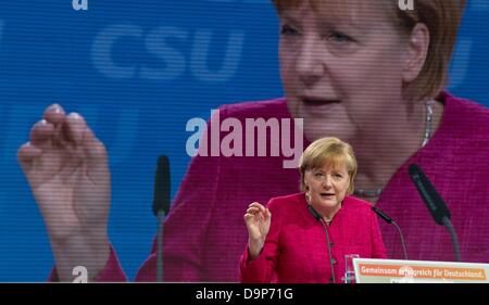 Berlino, Germania. Il 24 giugno 2013. CDU di leader di partito e il Cancelliere tedesco Angela Merkel parla di un CDU/CSU programma elettorale il congresso di Berlino, Germania, 24 giugno 2013. Entrambe le parti presentano il loro programma comune per il 2013-2017 periodo legislativo. Foto: Tim Brakemeier Foto Stock