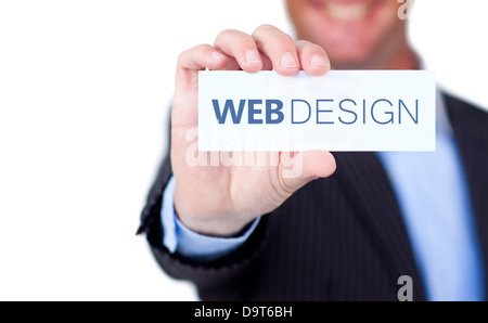 Imprenditore tenendo una etichetta con il web design scritto su di esso Foto Stock