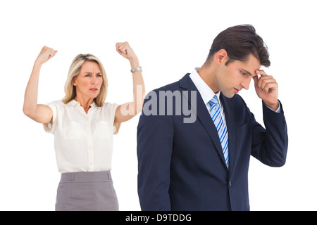 Imprenditore ansioso e rasserenanti imprenditrice Foto Stock
