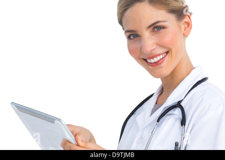 Infermiera sorridente con i tablet pc Foto Stock