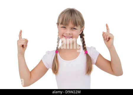 Felice giovane ragazza rivolta verso l'alto Foto Stock