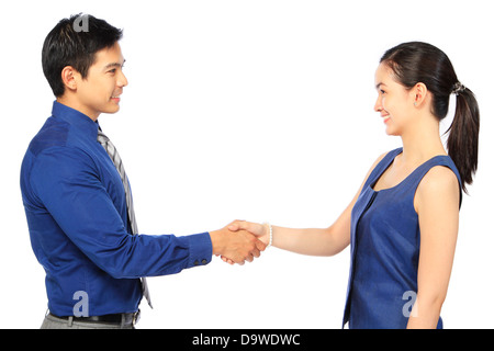 Un uomo e una donna si stringono la mano Foto Stock