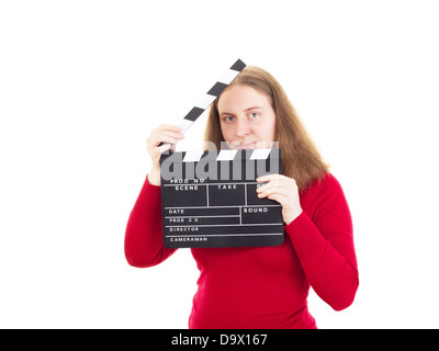 Donna sorridente con clapperboard nelle sue mani Foto Stock