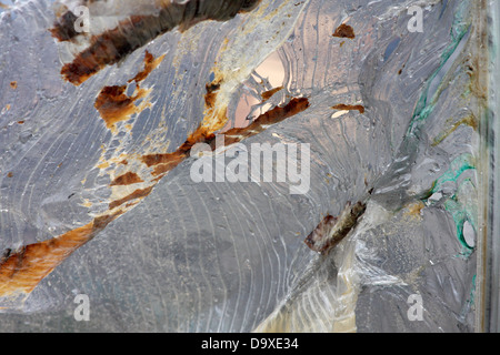 La plastica fusa a un incendio la scena in cui una serra bruciato in un incendio Foto Stock